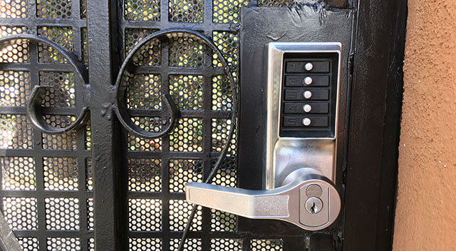 Front gate combination lock as seen at Lake Forest Shores