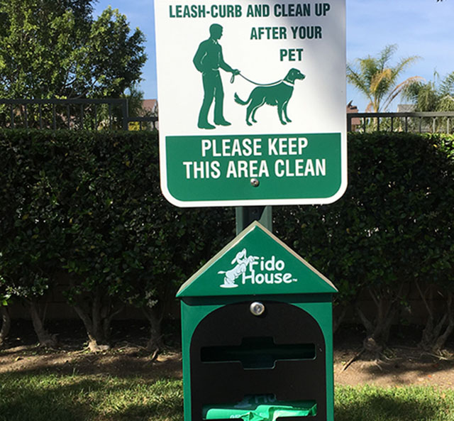 New pet waste disposal bag containers to help keep the area clean and disease free