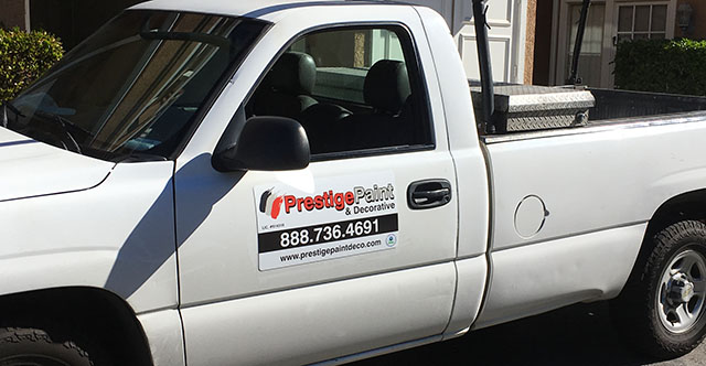 Paint contractor truck parked outside one of the Lake Forest Shores units