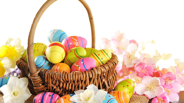 Picture of an Easter basket that is filled with colorful eggs.