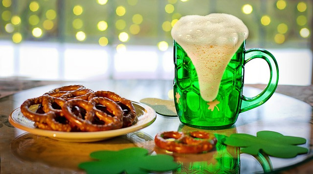 Green beer served on St. Patrick's Day with pretzels.